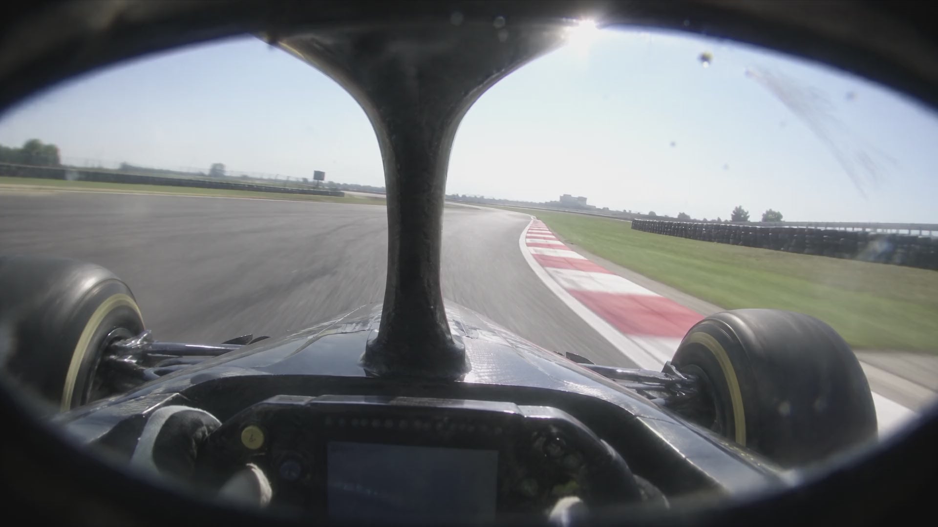 Blurred onboard view of a race car on track